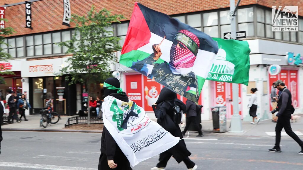Masked protesters carry Hamas flags at NYC Manhattan protest Friday | Invesloan.com